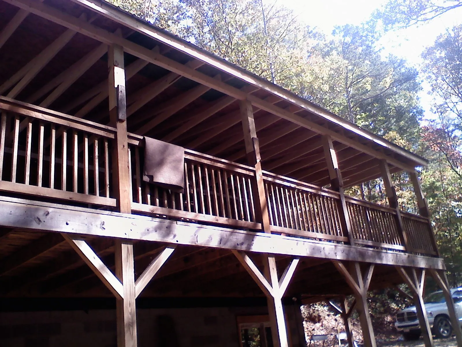 Timber framing under a new elevated porch and deck — Roof Leak Repair in Guin by Roofing Brothers
